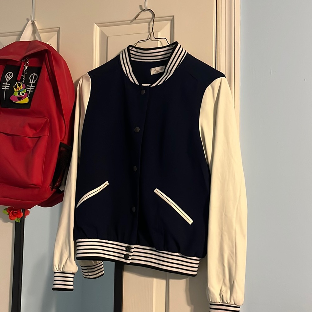 Navy blue and white bomber jacket